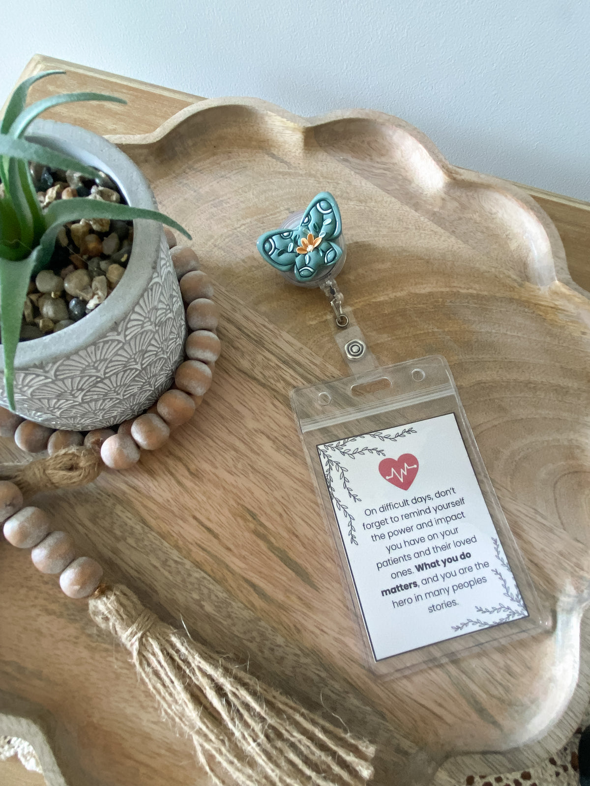 Sage green floral moth handmade polymer clay badge reel