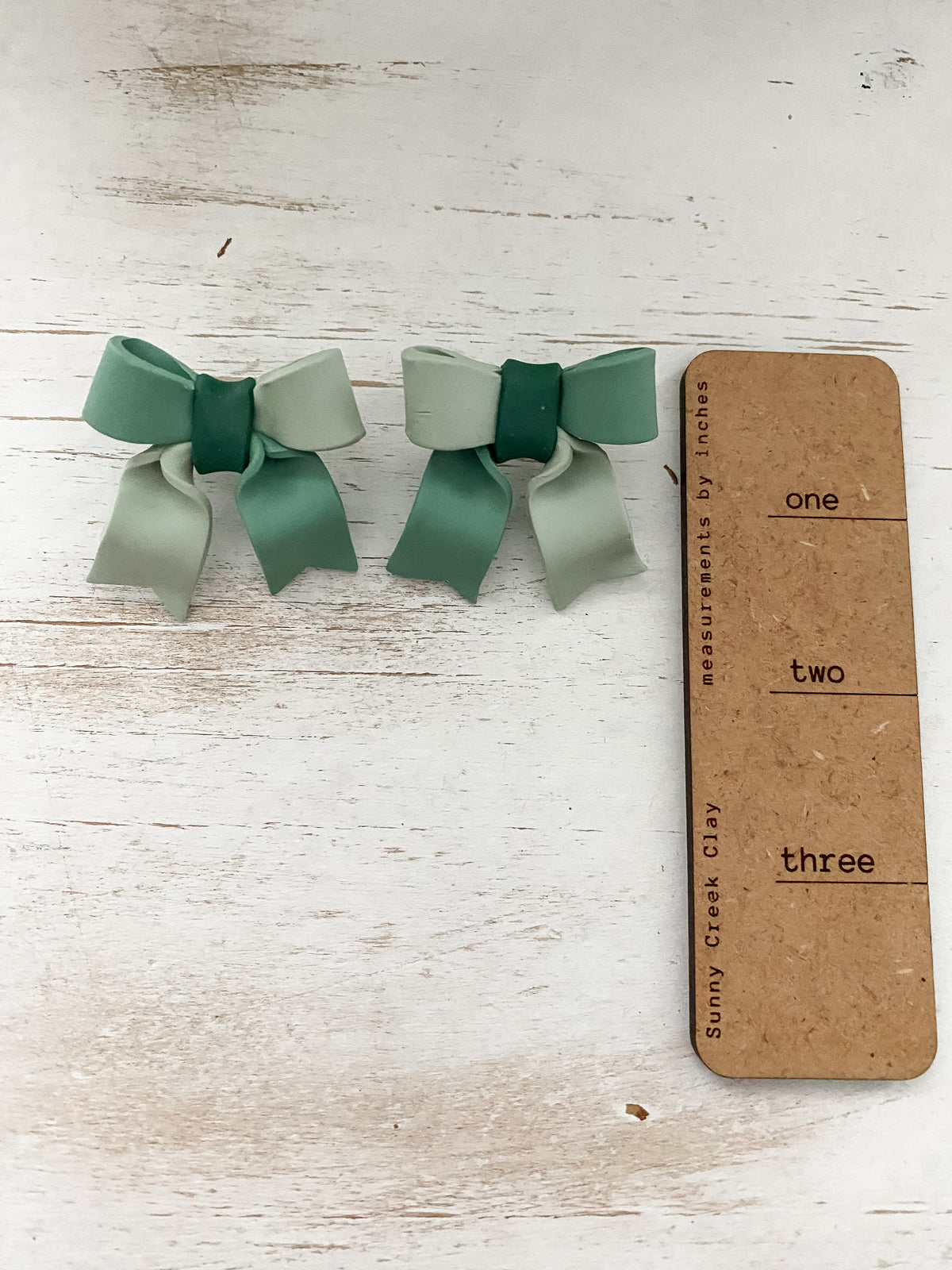 Seafoam handmade polymer clay bow earrings
