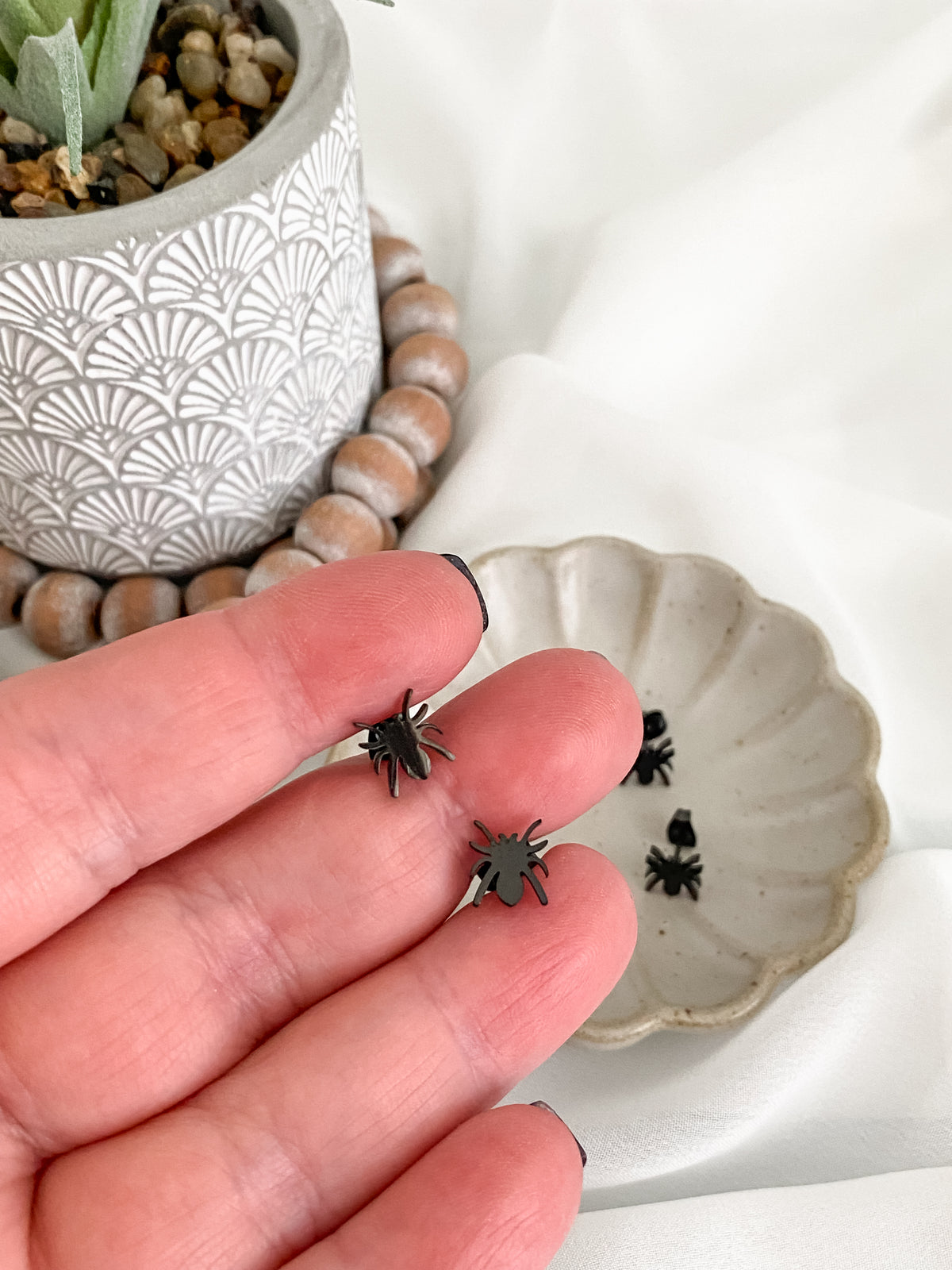 Black stainless steel spider stud earrings