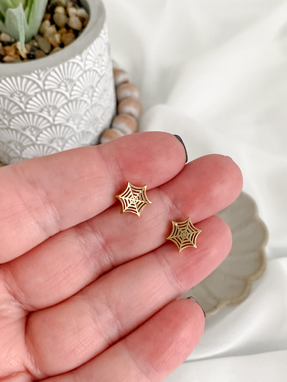 Gold stainless steel spiderweb stud earrings