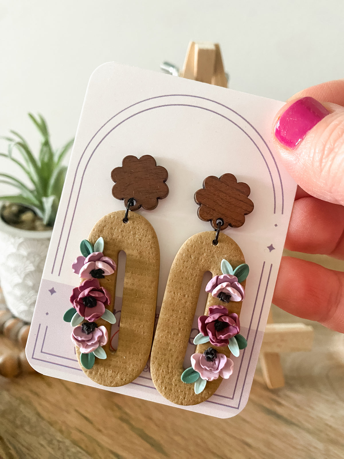 Oval tan and purple floral earrings
