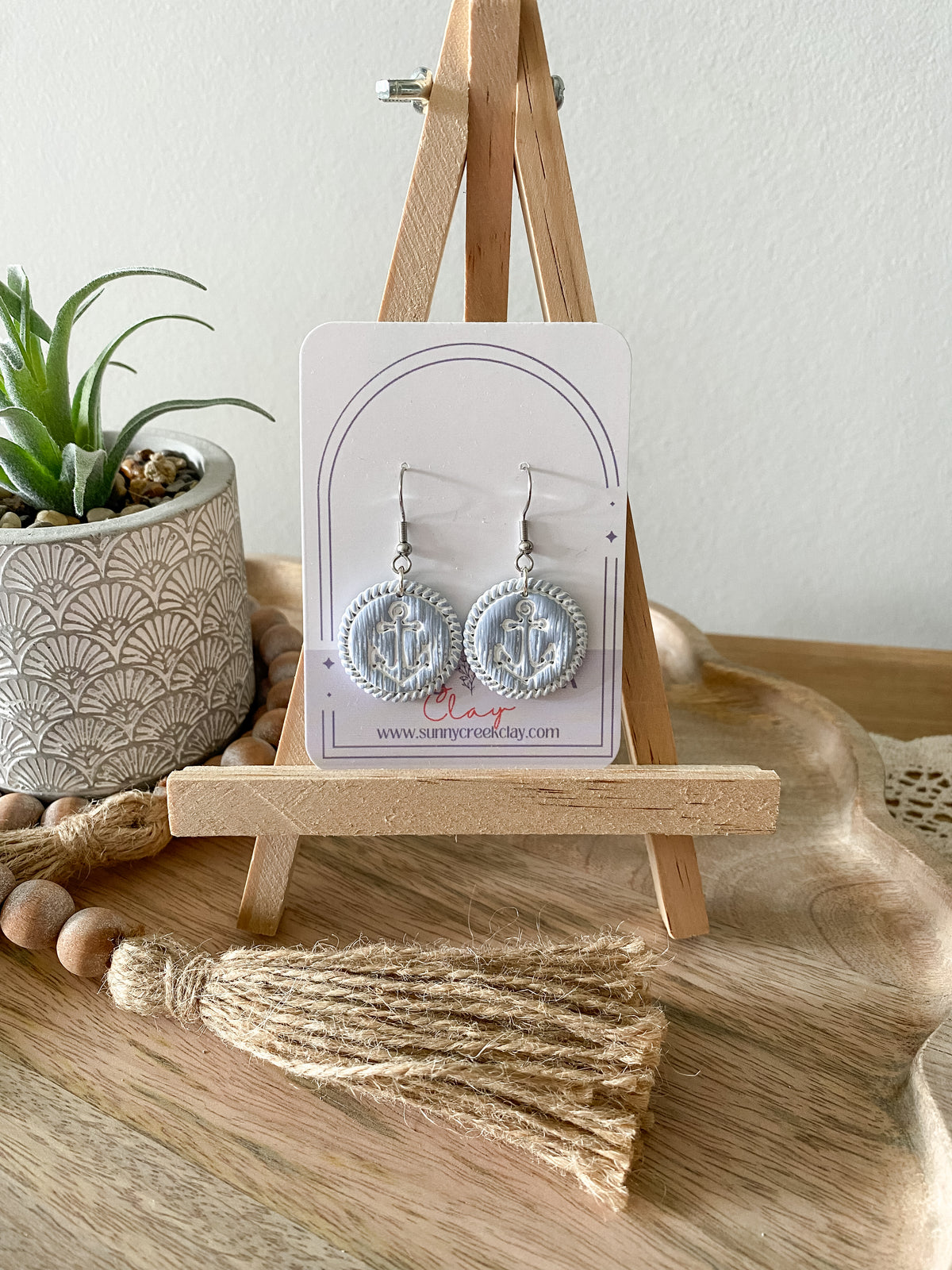 Soft blue coastal handmade polymer clay earring collection