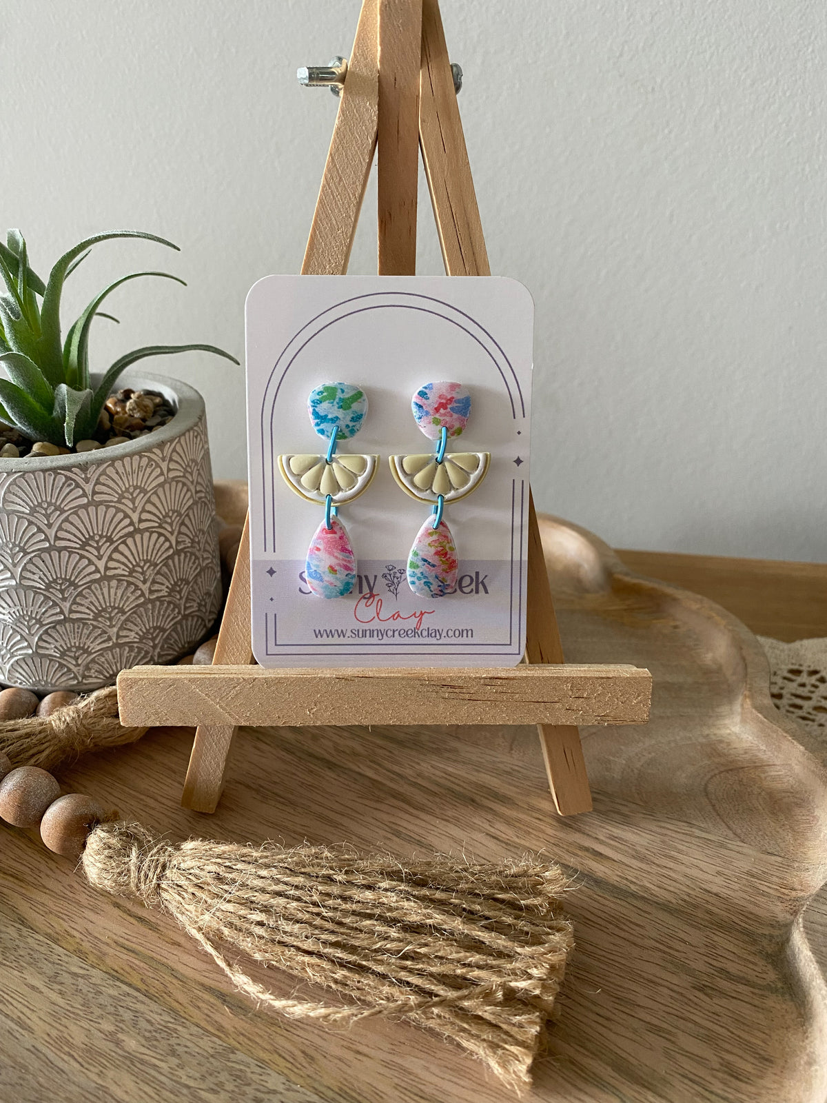 Soft paint splatter print handmade polymer clay earring collection