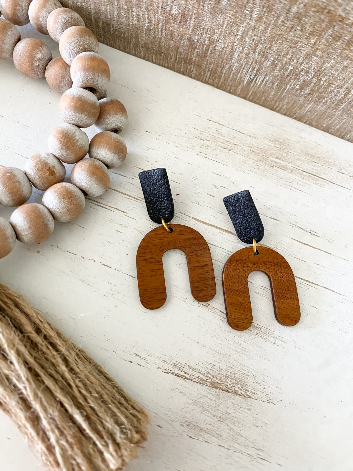 Lightweight walnut arch earring collection