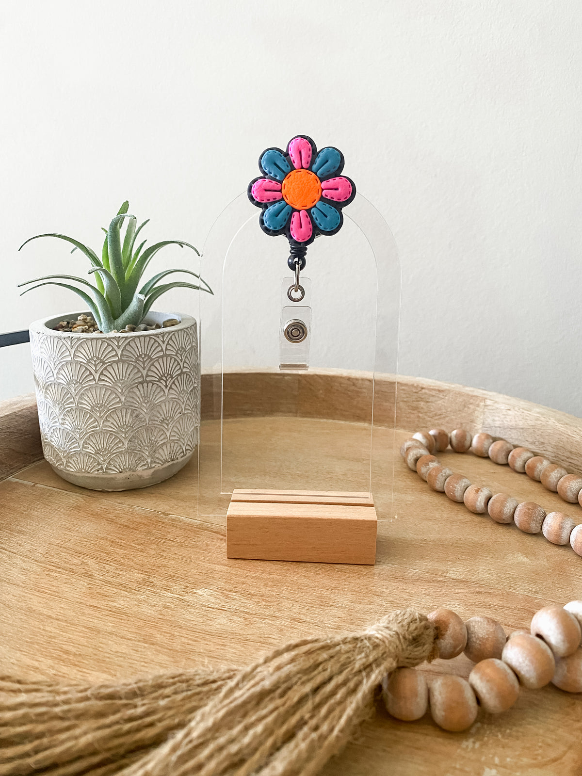 Neon pink & blue stitched flower handmade poylmer clay badge reel