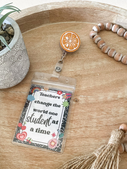 Orange handmade polymer clay badge reel