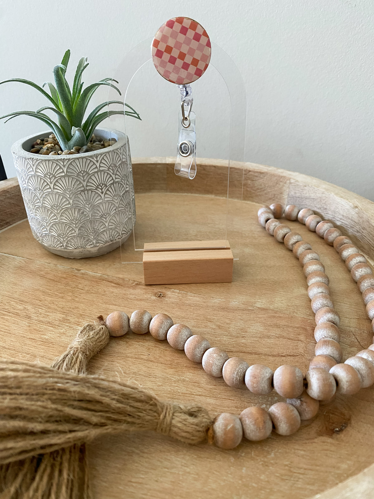 Pink checkered handmade polymer clay badge reel