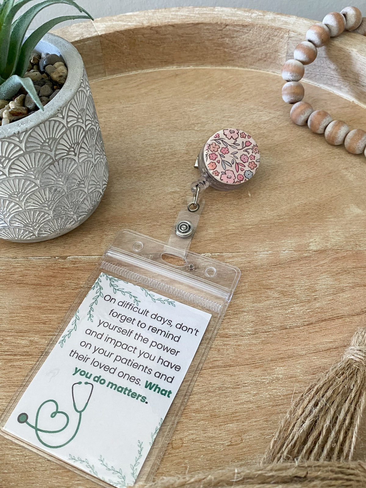Soft pastel pink handmade polymer clay badge reel