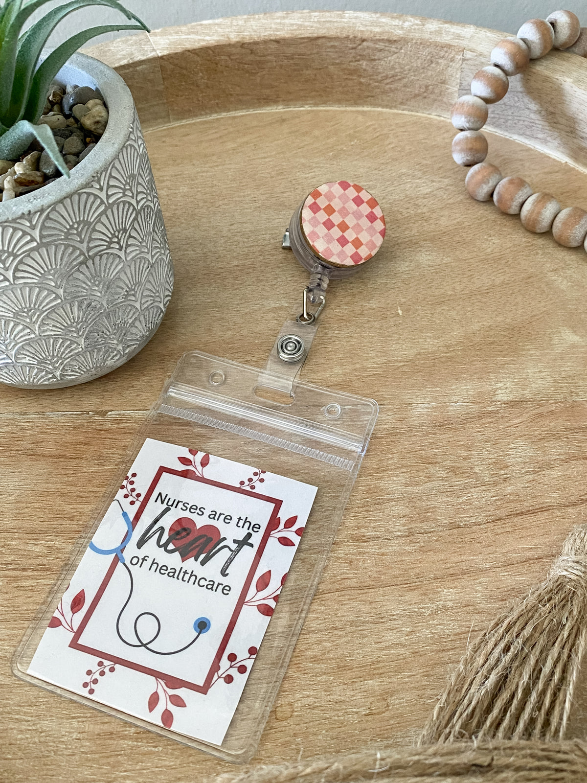 Pink checkered handmade polymer clay badge reel