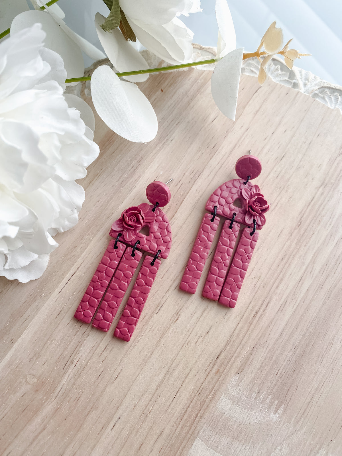 Maroon floral dangle earrings