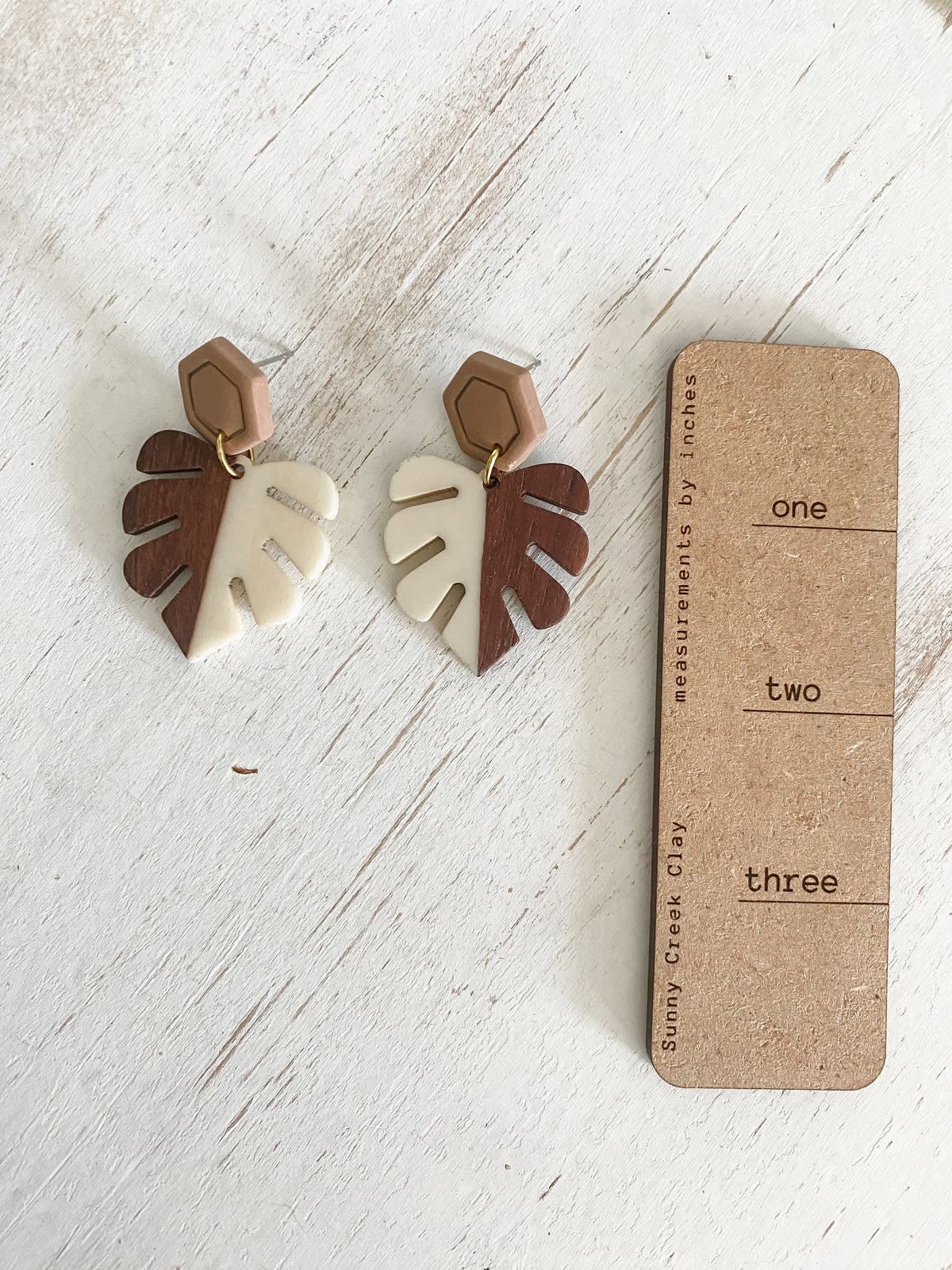 Off-white wood monstera dangles