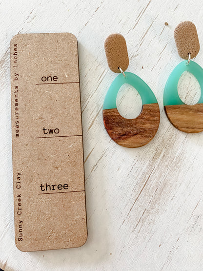 Teal resin & walnut polymer clay earrings