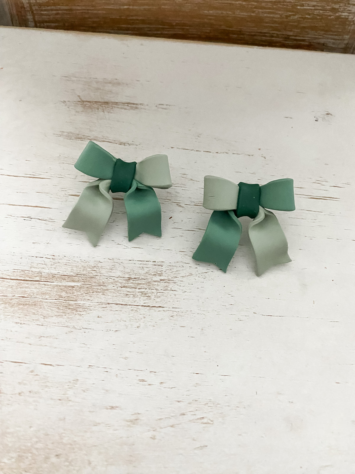 Seafoam handmade polymer clay bow earrings