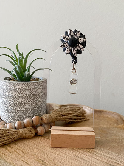 Black and white print daisy handmade polymer clay badge reel