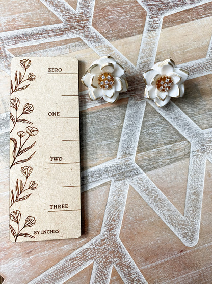 White and gold poinsettia handmade polymer clay stud earrings