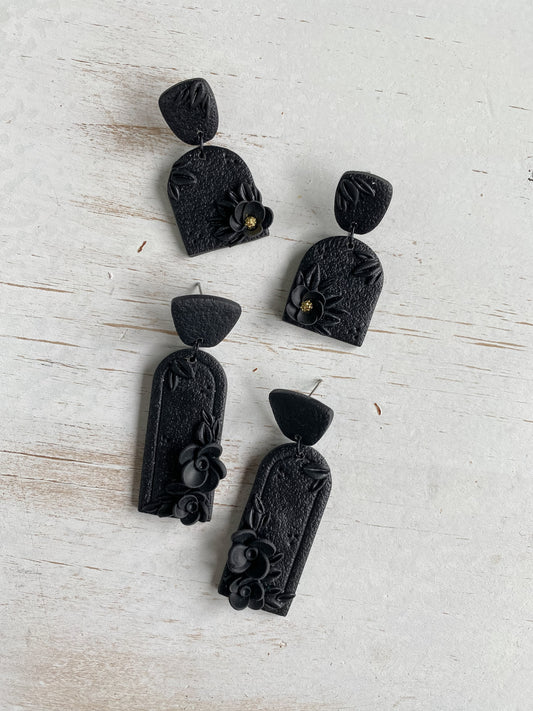Black handmade floral polymer clay earrings