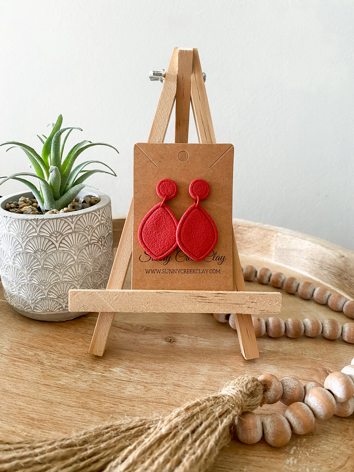 Embossed teardrop handmade polymer clay earring collection