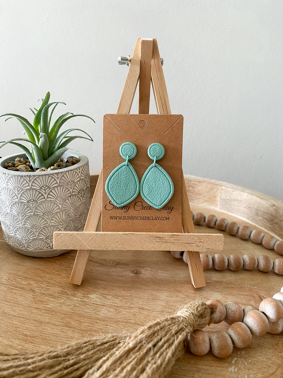 Embossed teardrop handmade polymer clay earring collection