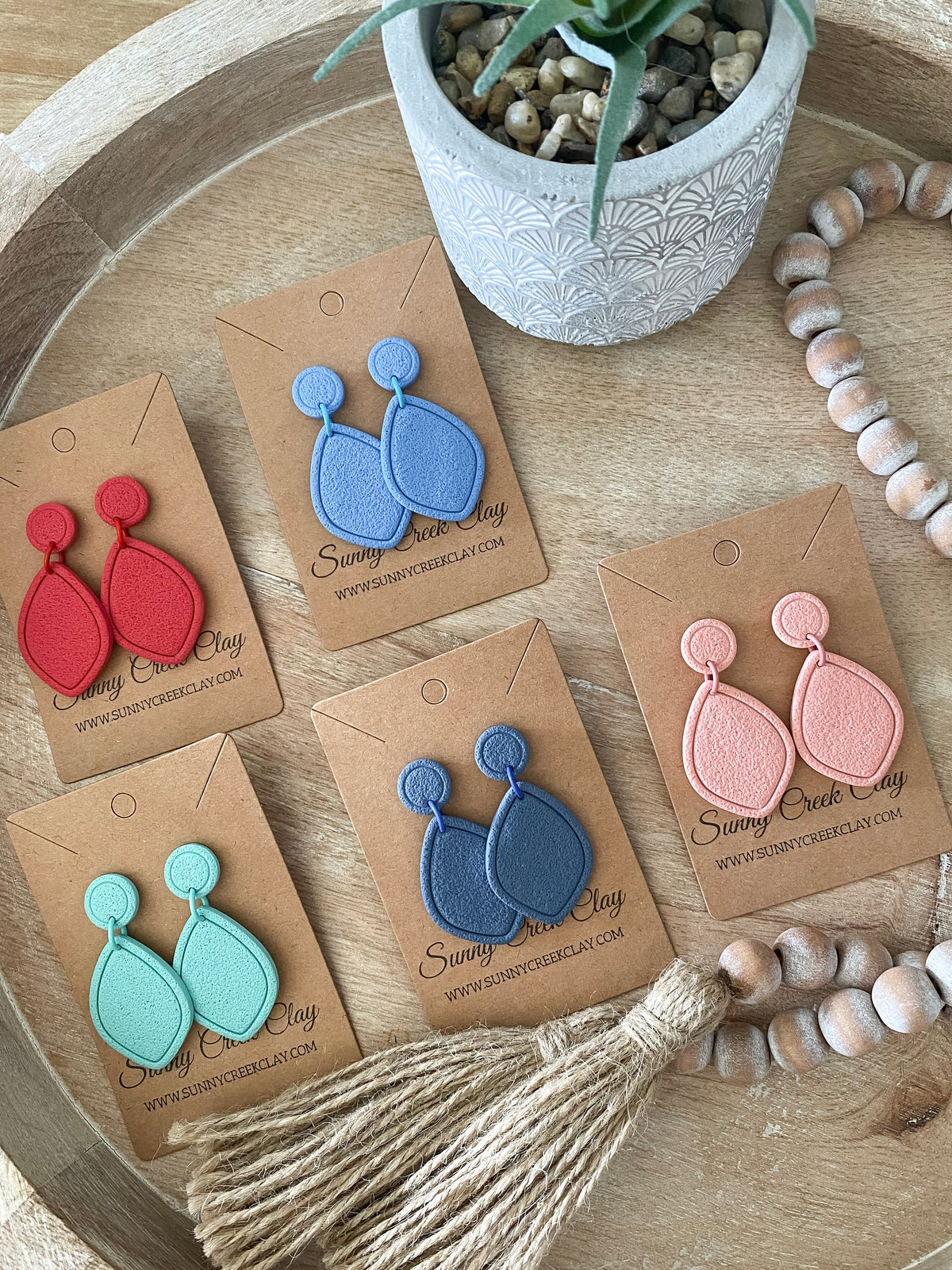 Embossed teardrop handmade polymer clay earring collection