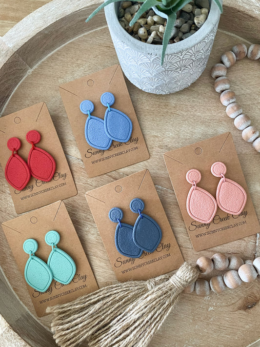 Embossed teardrop handmade polymer clay earring collection