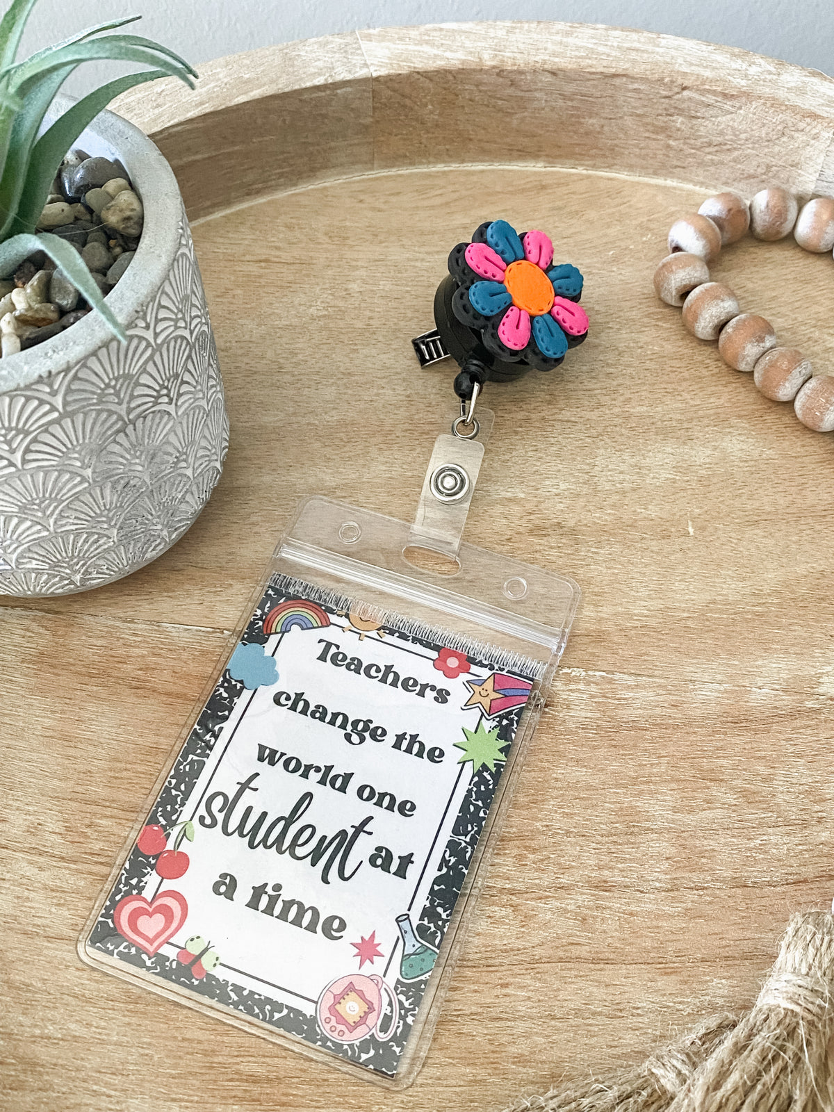 Neon pink & blue stitched flower handmade poylmer clay badge reel