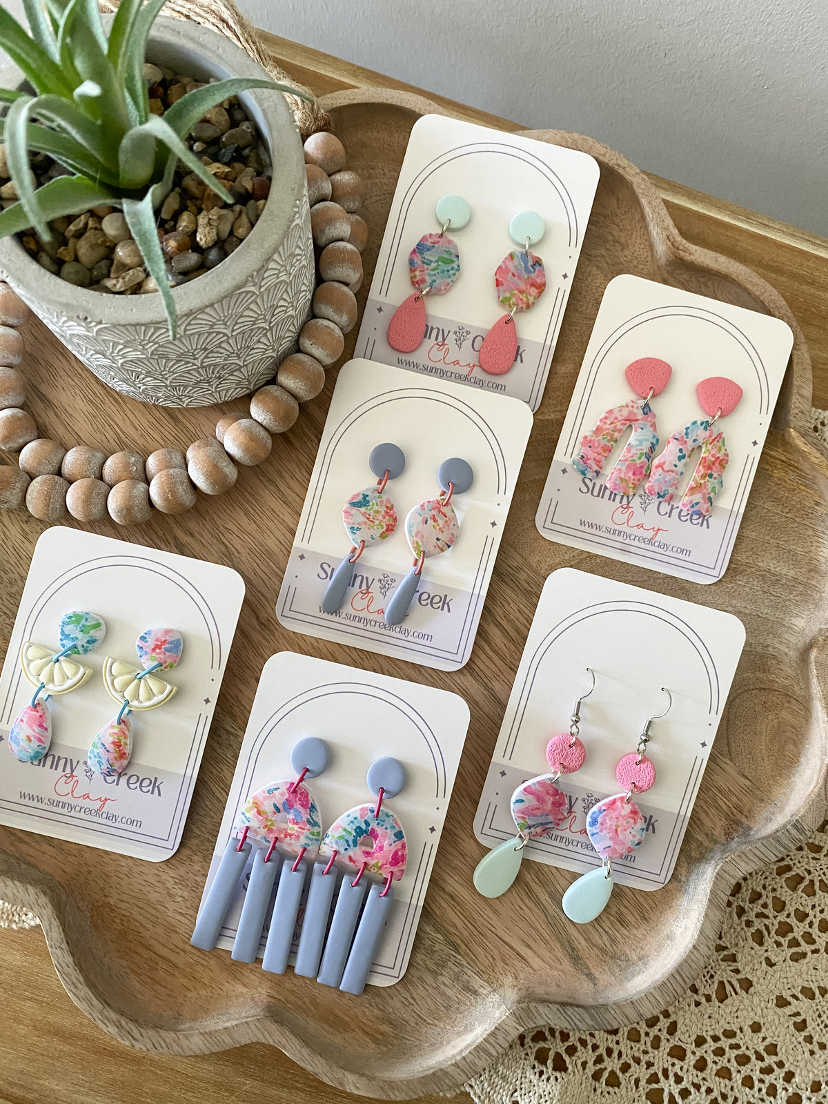 Soft paint splatter print handmade polymer clay earring collection