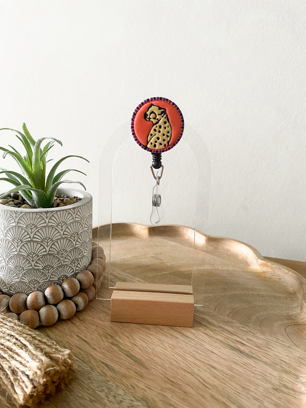 Orange cheetah handmade polymer clay badge reel
