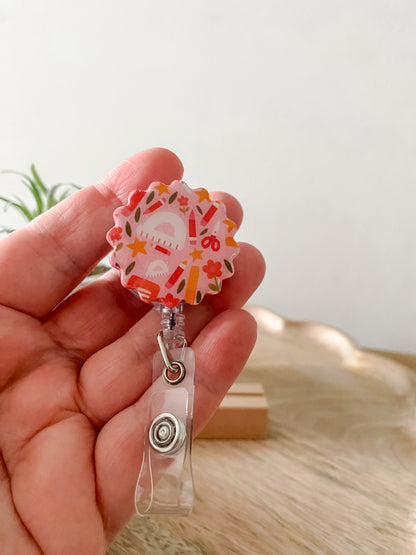 Pinkish back to school circle handmade polymer clay badge reel