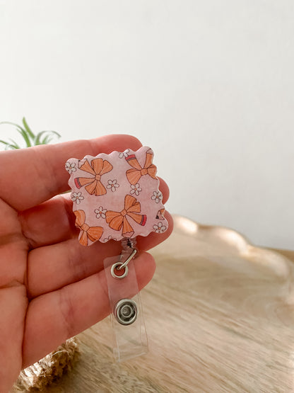 Pink pencil bow square handmade polymer clay badge reel