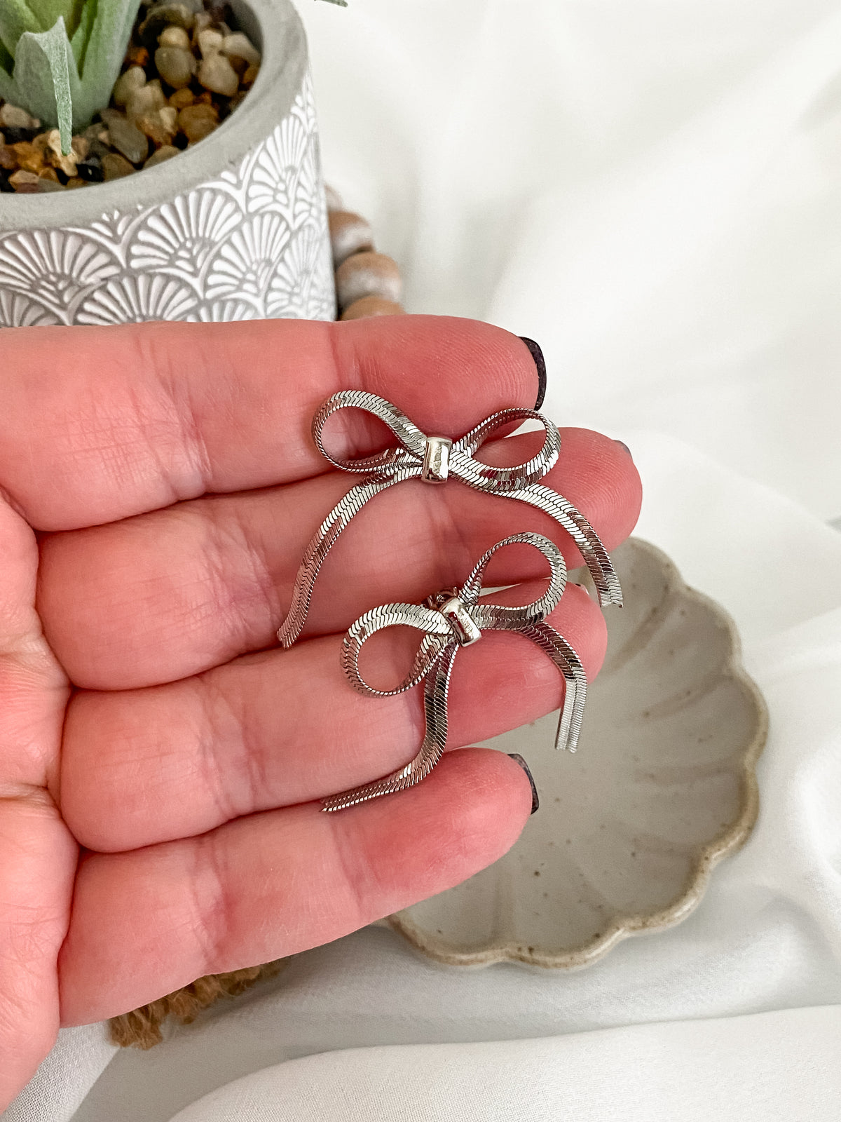 Platinum Bow Stud Earrings