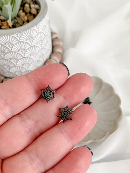 Black stainless steel spiderweb stud earrings