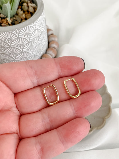 Medium elongated gold plated huggie earrings