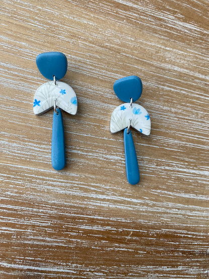 White and blue floral dangle earrings