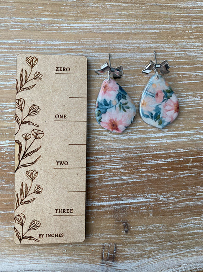 Soft pink and blue floral handmade polymer clay earring collection