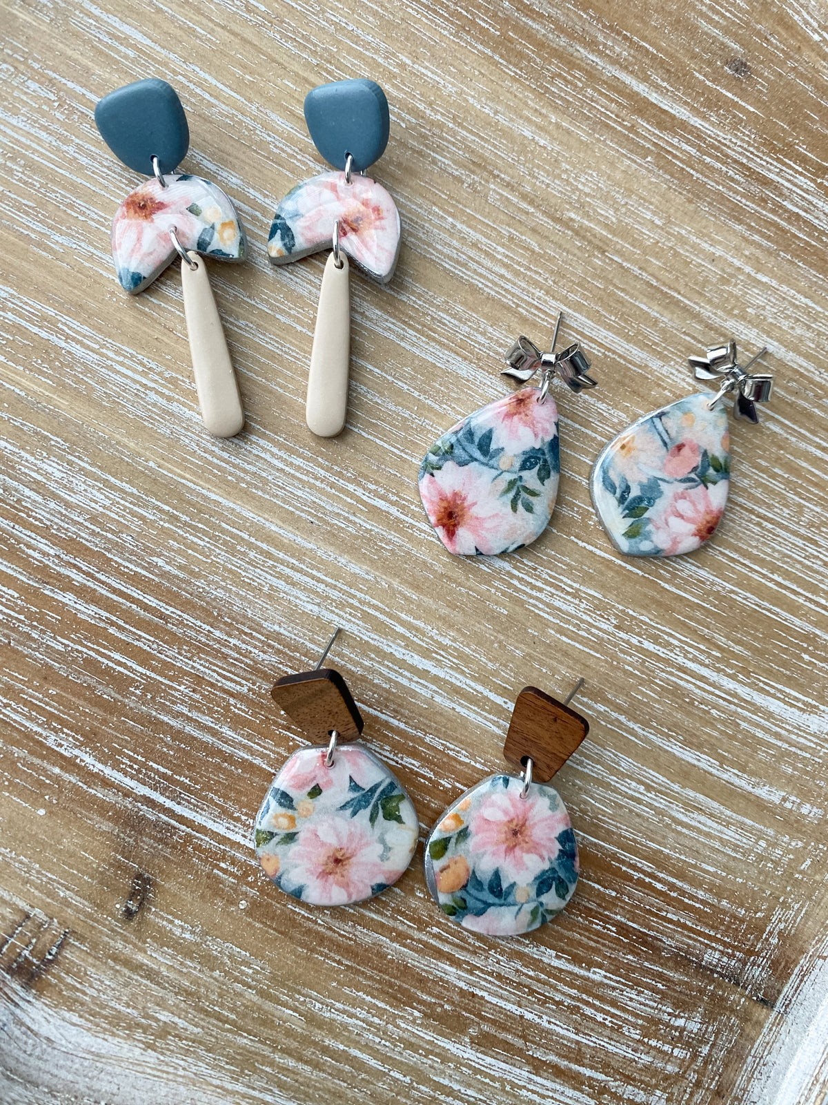 Soft pink and blue floral handmade polymer clay earring collection