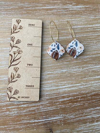 Blue floral football handmade polymer clay earring collection