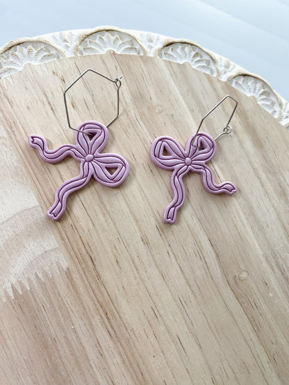 Light purple bow handmade polymer clay earrings