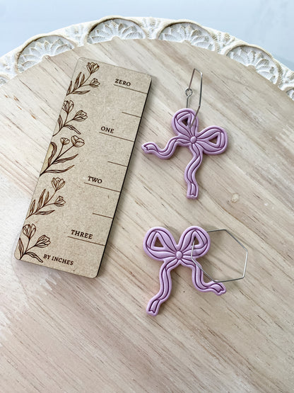Light purple bow handmade polymer clay earrings