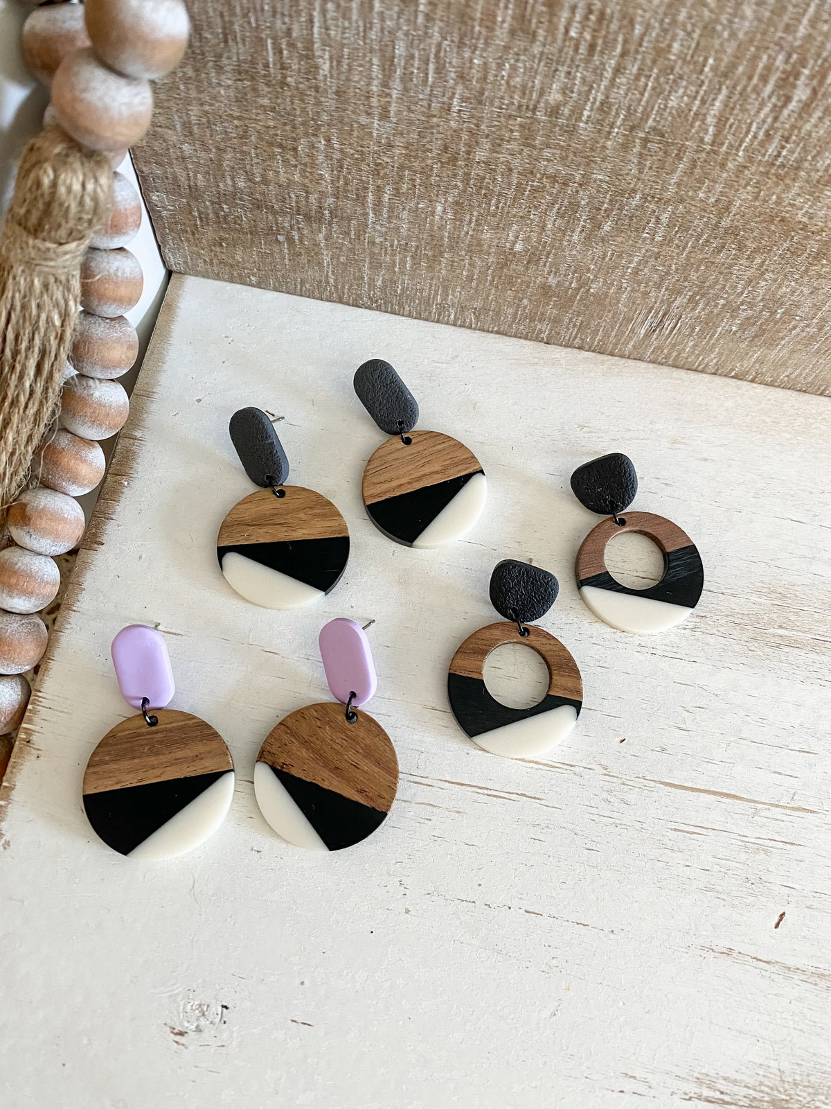 Black and white resin & walnut earring collection
