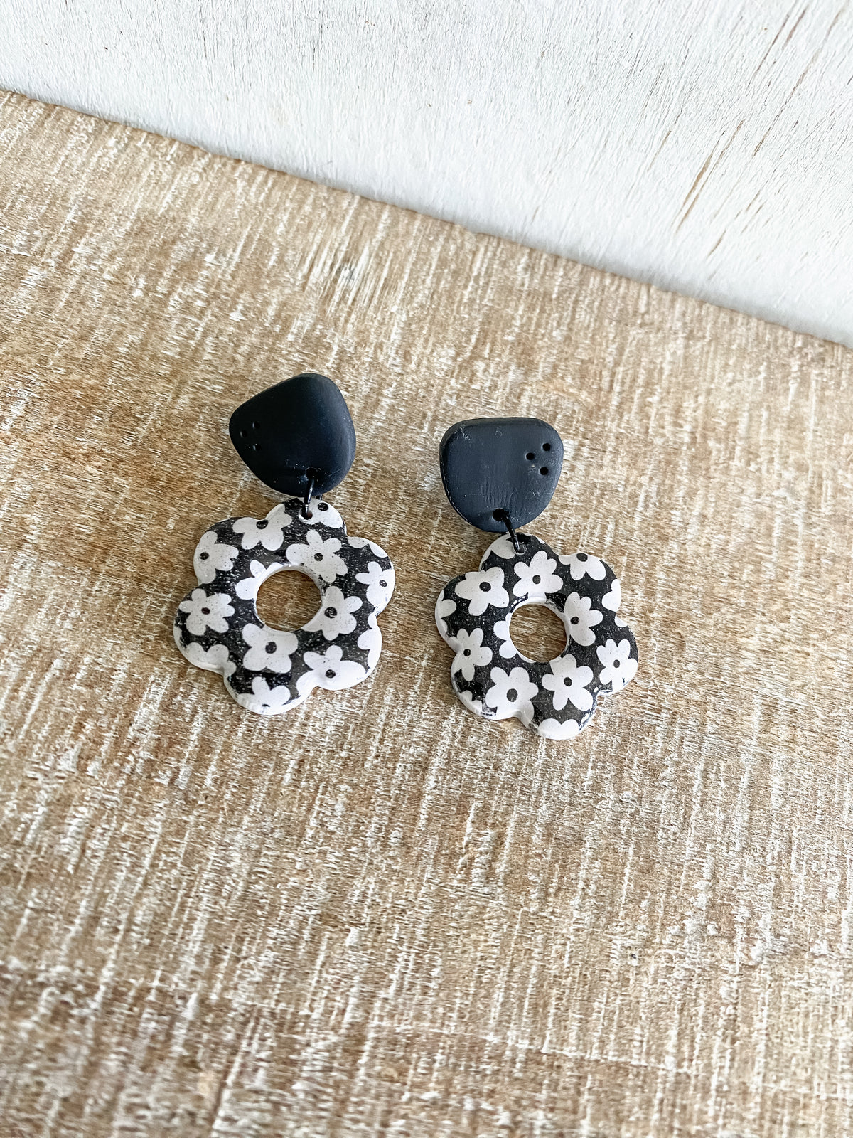 Black floral dangles