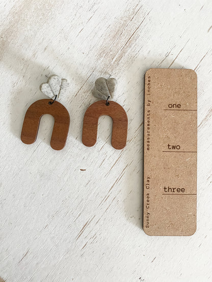Lightweight walnut arch earring collection