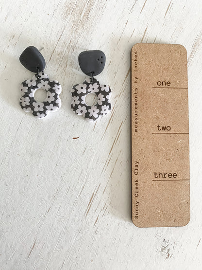 Black floral dangles