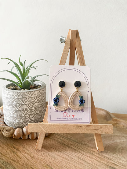Off-white and blue handmade floral polymer clay earrings