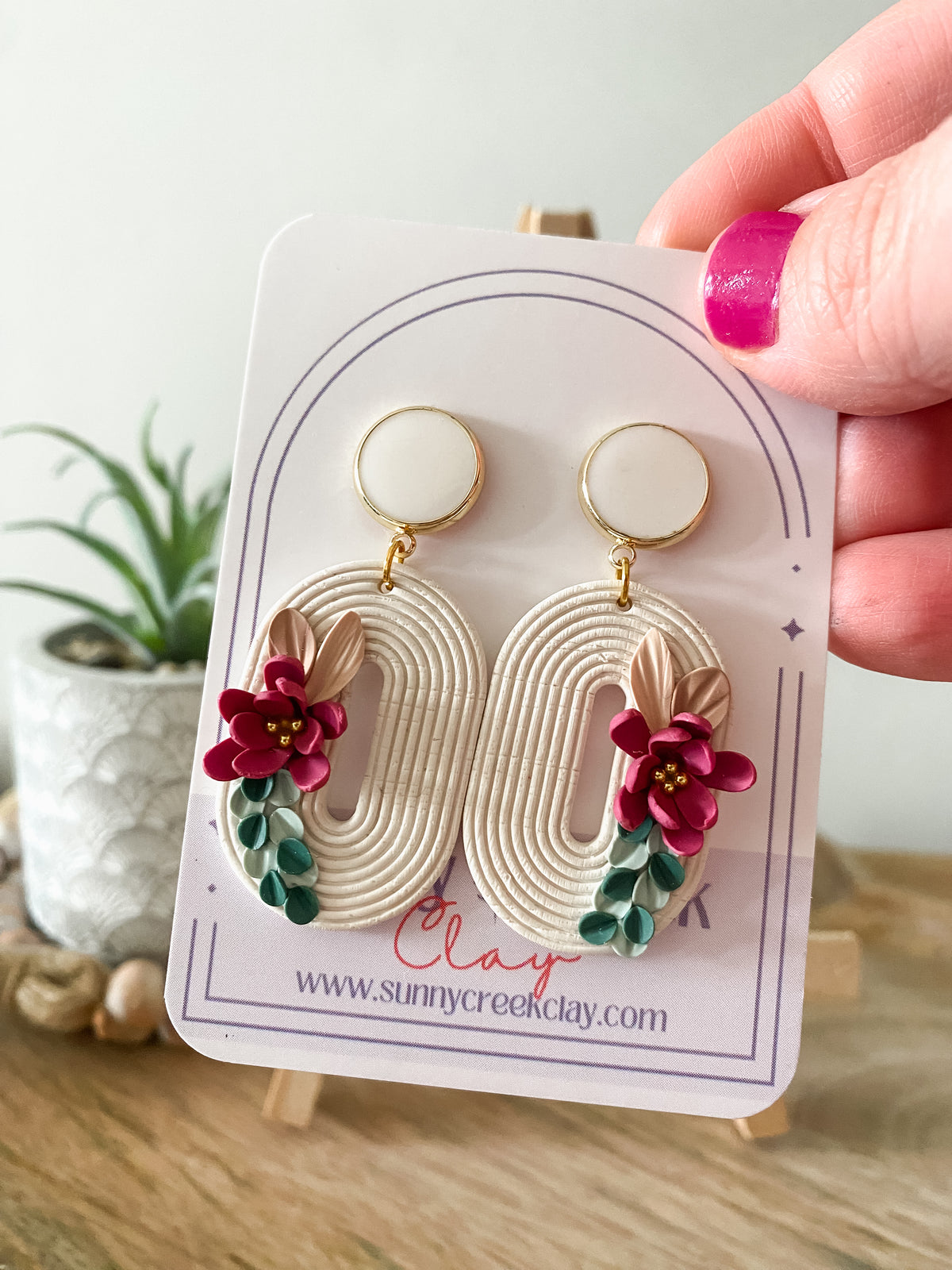 Off-white embossed handmade floral polymer clay earrings