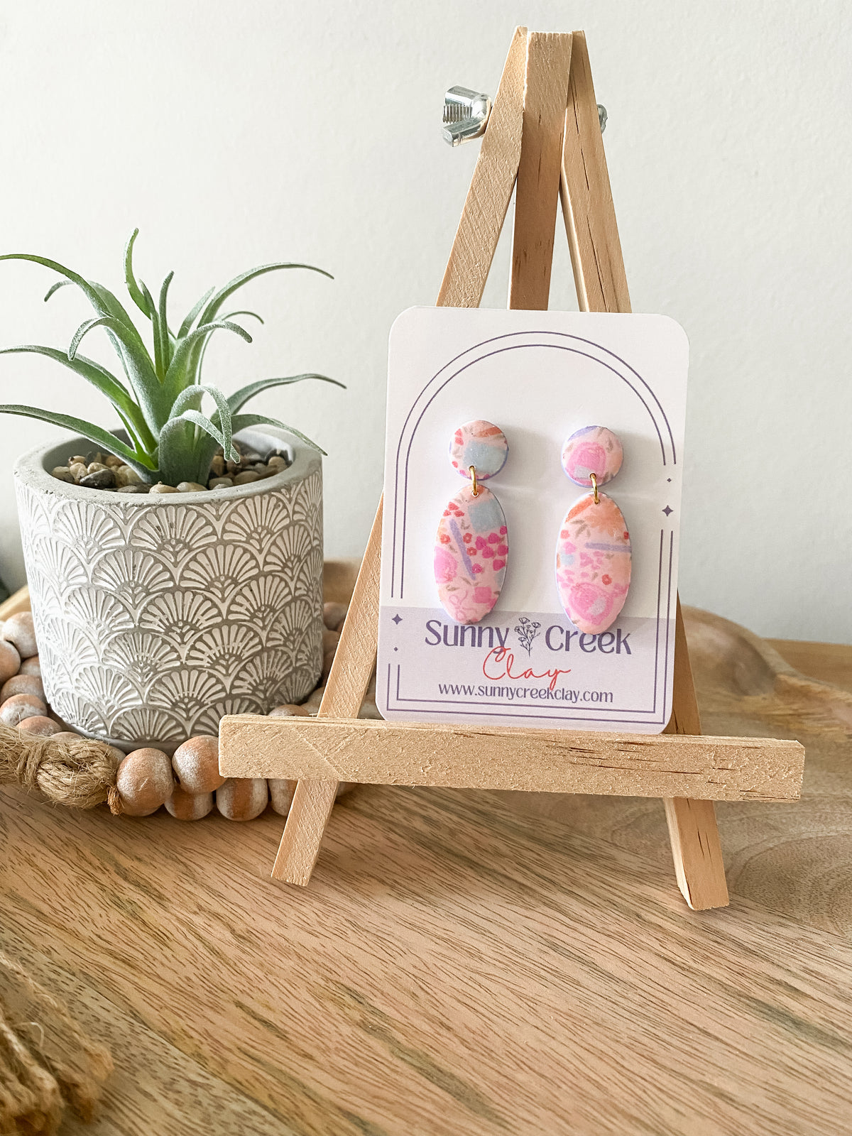Soft pink teacher print handmade polymer clay earring collection