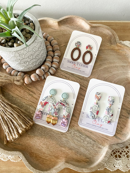 Teal teacher print handmade polymer clay earring collection