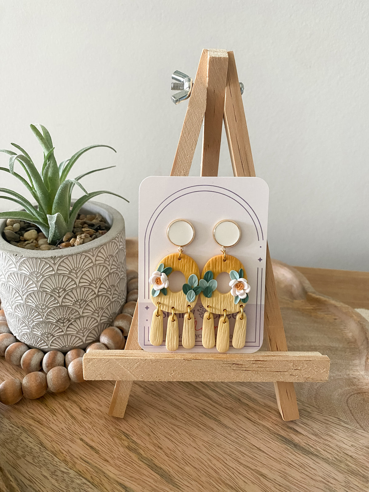 Orange and yellow floral dangle earrings