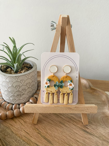 Orange and yellow floral dangle earrings