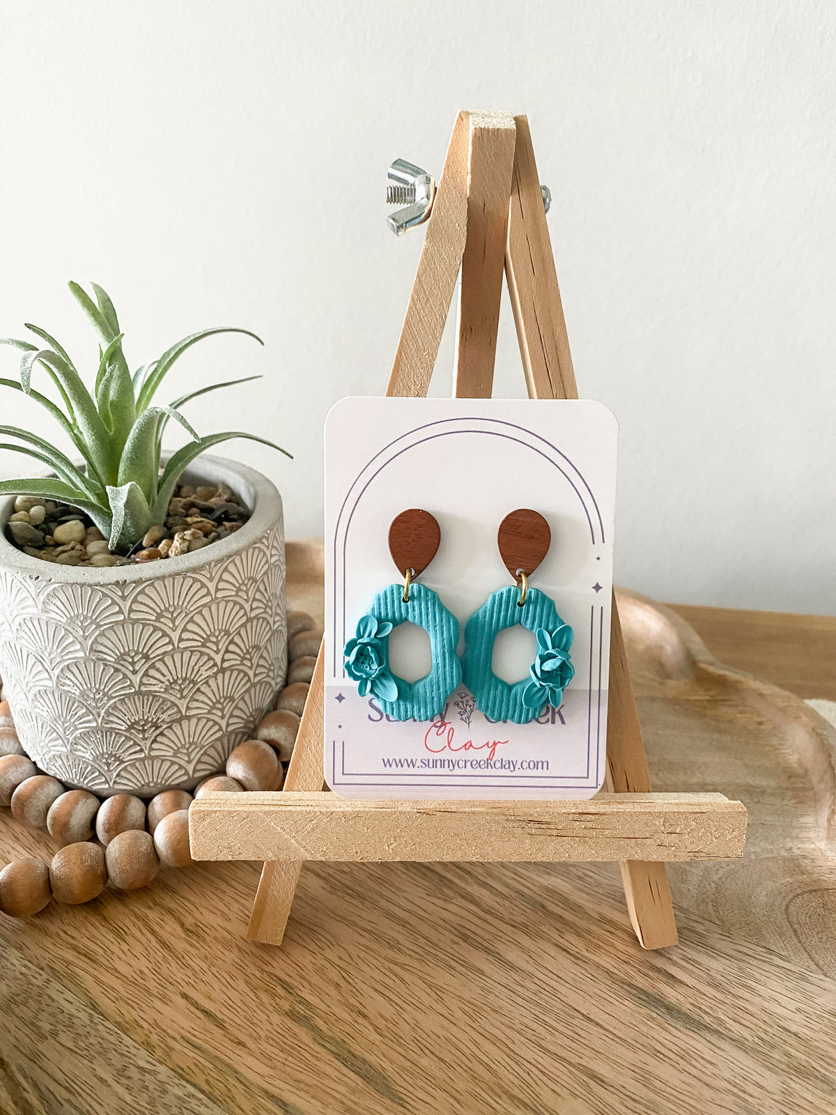 Teal floral oval earrings