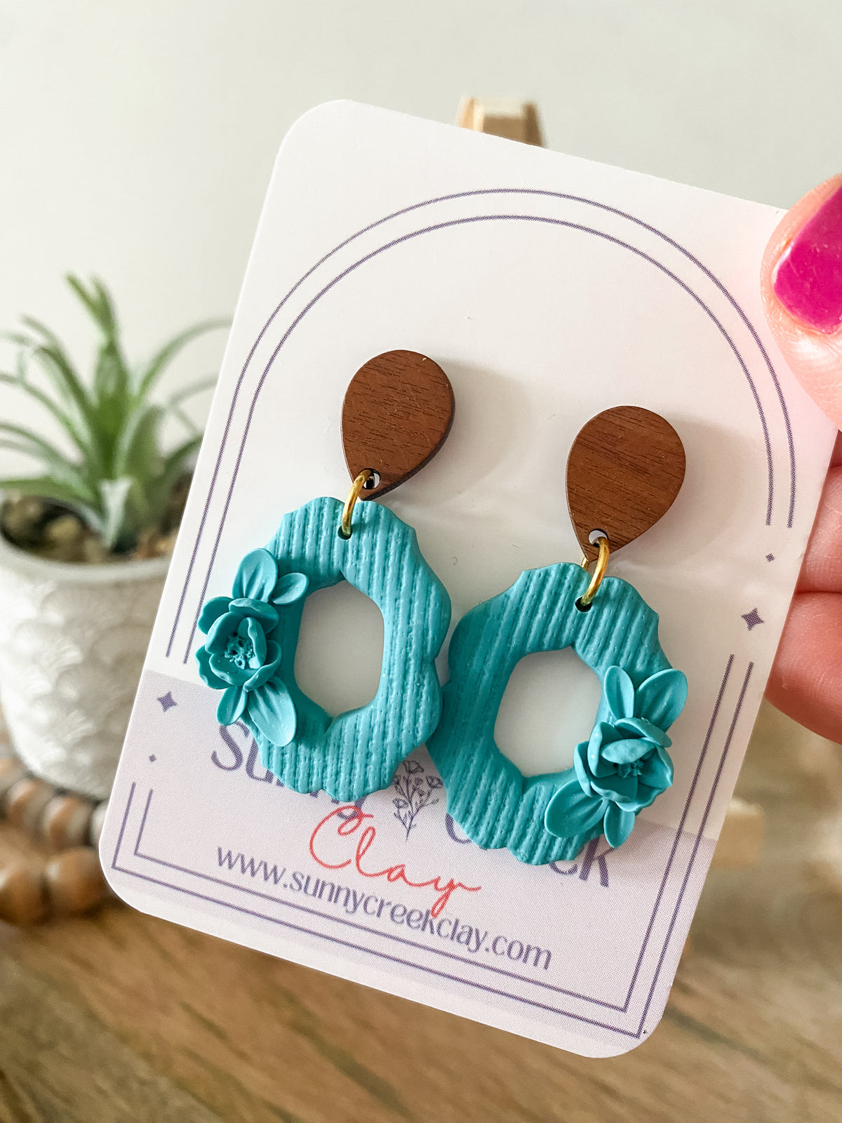 Teal floral oval earrings